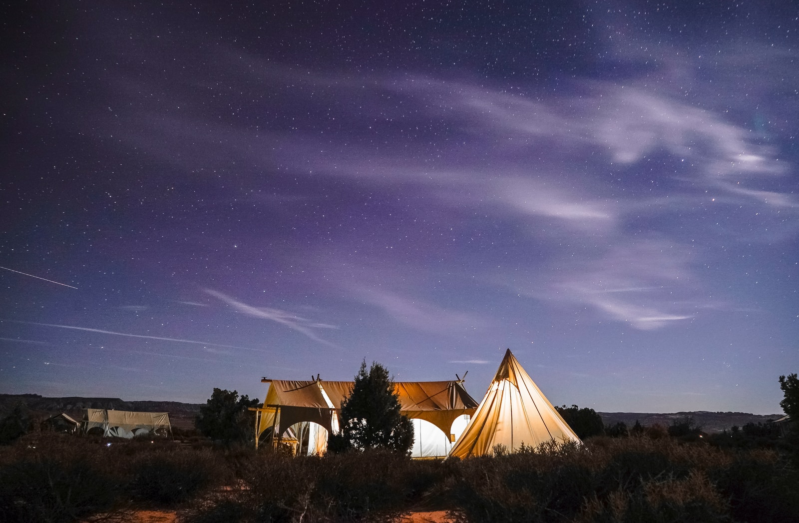 camping tent on field during nighttime